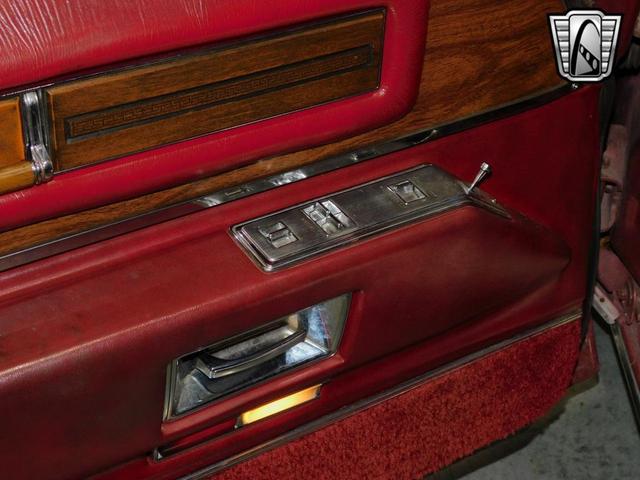 Photo of 1975 Red Cadillac DeVille