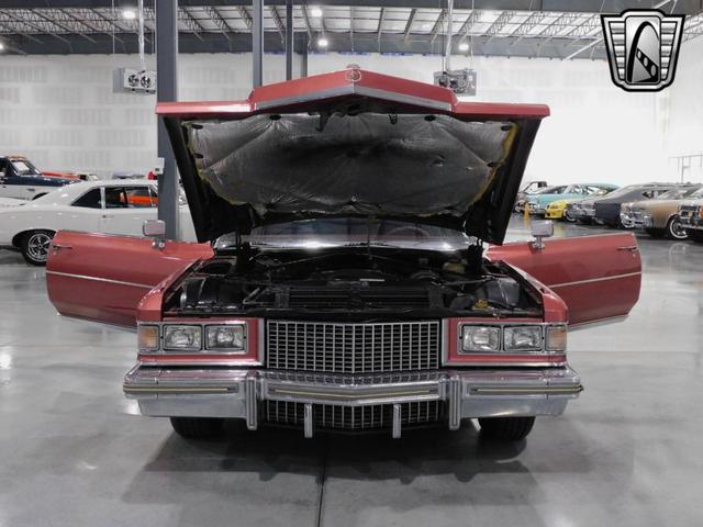 Photo of 1975 Red Cadillac DeVille