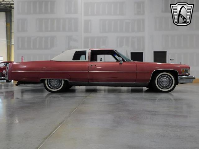 Photo of 1975 Red Cadillac DeVille