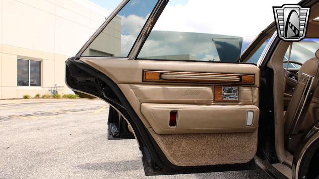 Photo of 1985 Black Cadillac Seville