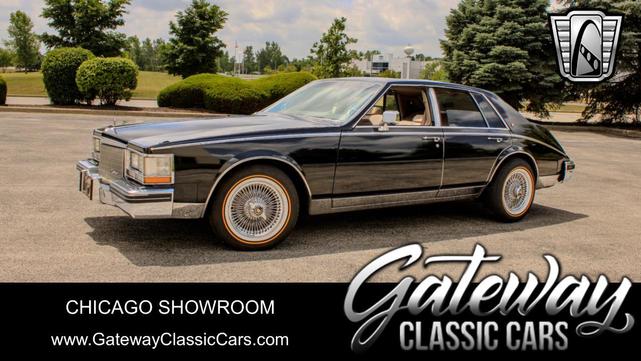 Photo of 1985 Black Cadillac Seville