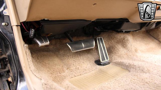 Photo of 1985 Black Cadillac Seville
