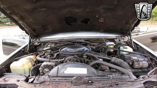 Photo of 1985 Black Cadillac Seville