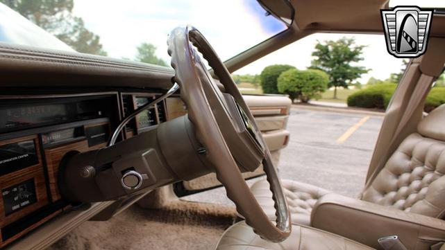 Photo of 1985 Black Cadillac Seville