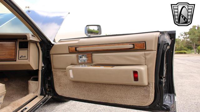 Photo of 1985 Black Cadillac Seville