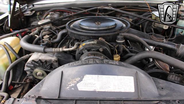 Photo of 1985 Black Cadillac Seville