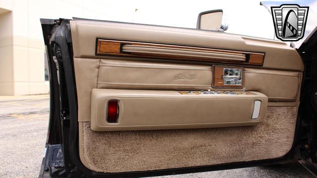 Photo of 1985 Black Cadillac Seville
