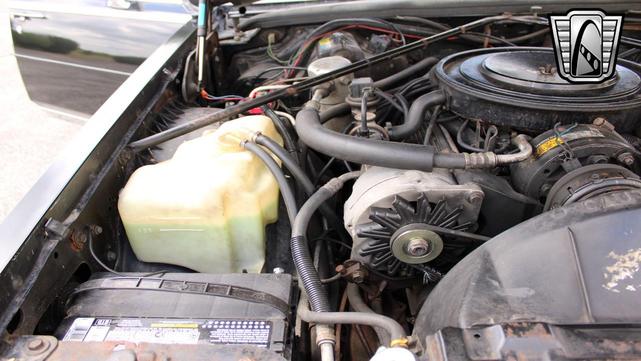 Photo of 1985 Black Cadillac Seville