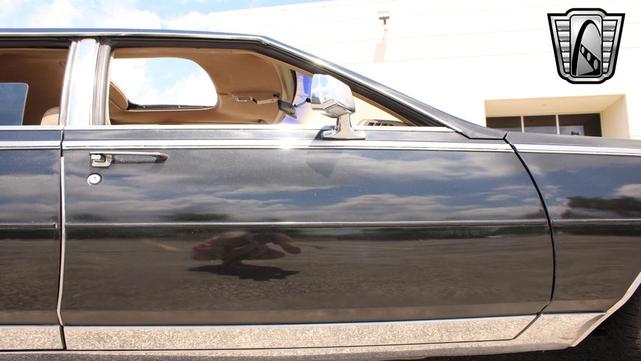 Photo of 1985 Black Cadillac Seville