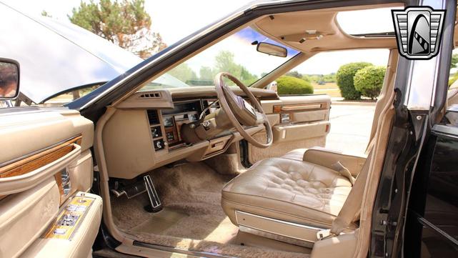 Photo of 1985 Black Cadillac Seville