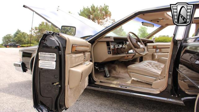 Photo of 1985 Black Cadillac Seville