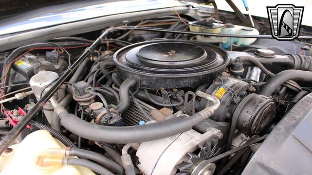 Photo of 1985 Black Cadillac Seville