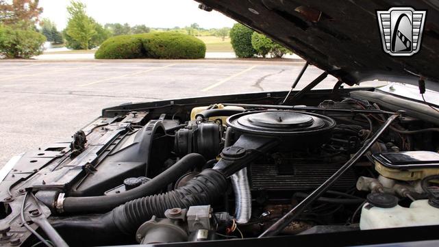 Photo of 1985 Black Cadillac Seville