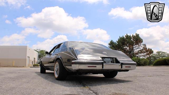 Photo of 1985 Black Cadillac Seville