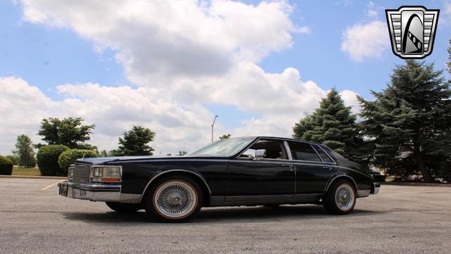 Photo of 1985 Black Cadillac Seville
