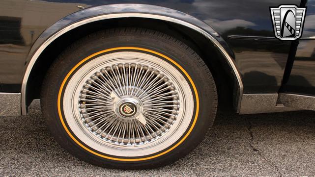 Photo of 1985 Black Cadillac Seville