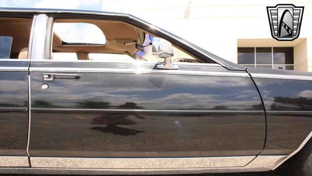 Photo of 1985 Black Cadillac Seville