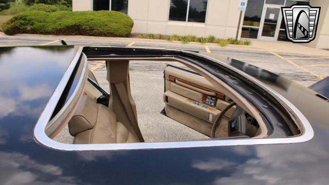 Photo of 1985 Black Cadillac Seville