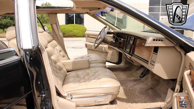 Photo of 1985 Black Cadillac Seville
