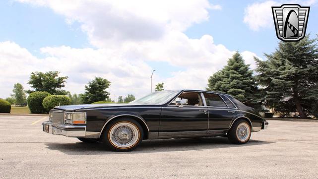 Photo of 1985 Black Cadillac Seville