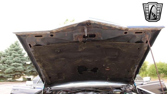 Photo of 1985 Black Cadillac Seville