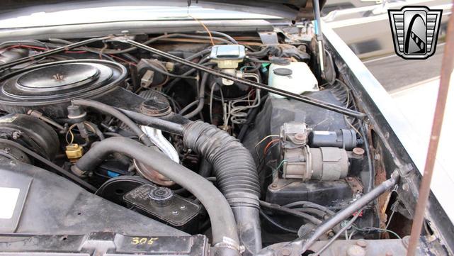 Photo of 1985 Black Cadillac Seville