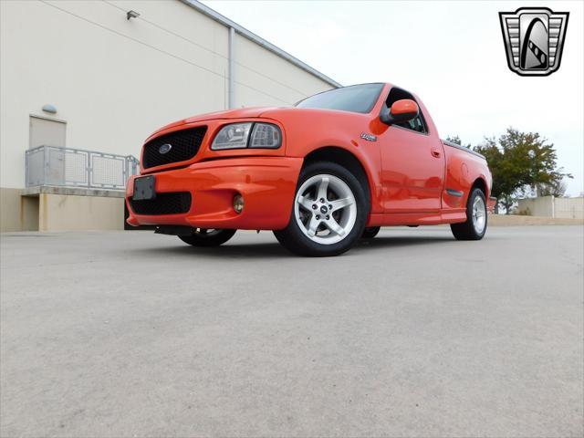 Photo of 1999 Inferno Red Ford F-150