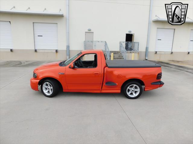 Photo of 1999 Inferno Red Ford F-150