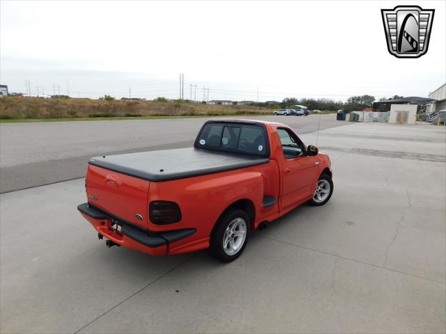 Photo of 1999 Inferno Red Ford F-150