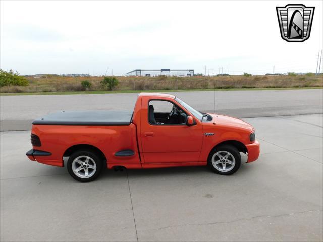 Photo of 1999 Inferno Red Ford F-150