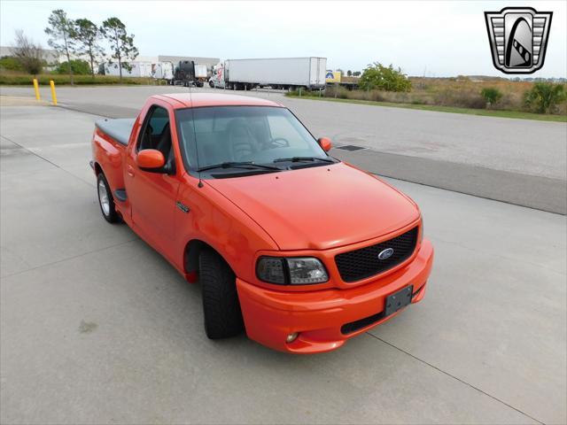 Photo of 1999 Inferno Red Ford F-150