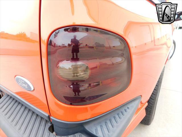 Photo of 1999 Inferno Red Ford F-150