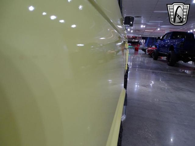 Photo of 1977 Yellow Ford Bronco