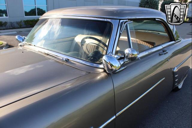 Photo of 1952 Gold Ford Crestline