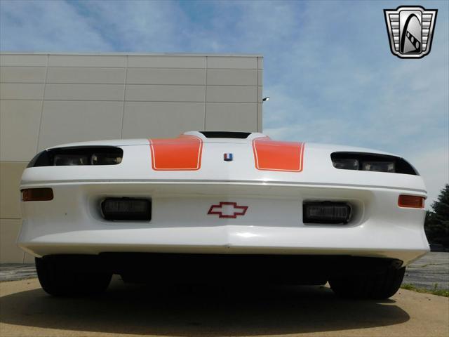 Photo of 1997 White with orange racing stripes Chevrolet Camaro