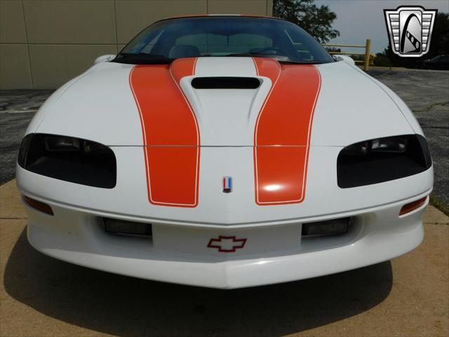 Photo of 1997 White with orange racing stripes Chevrolet Camaro