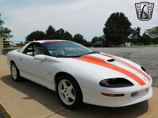 Photo of 1997 White with orange racing stripes Chevrolet Camaro
