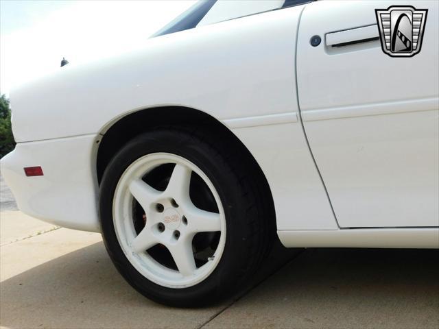 Photo of 1997 White with orange racing stripes Chevrolet Camaro