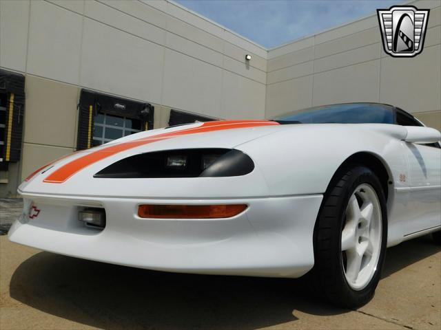 Photo of 1997 White with orange racing stripes Chevrolet Camaro