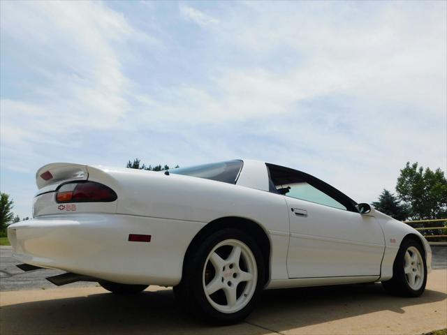 Photo of 1997 White with orange racing stripes Chevrolet Camaro