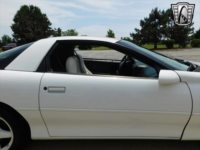 Photo of 1997 White with orange racing stripes Chevrolet Camaro