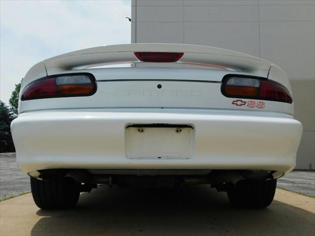 Photo of 1997 White with orange racing stripes Chevrolet Camaro