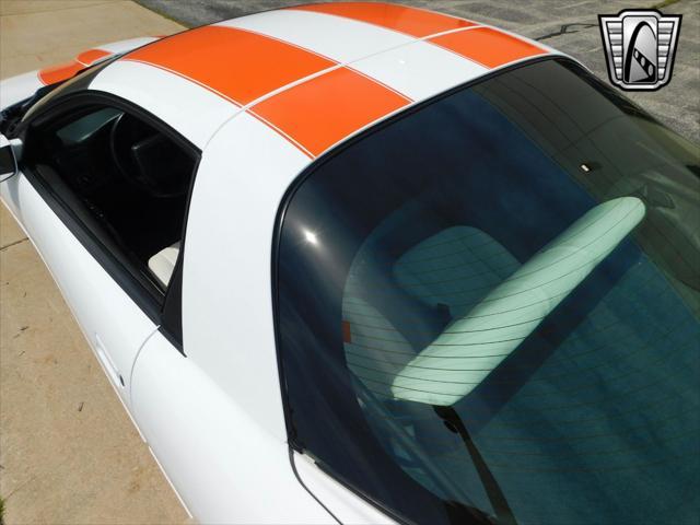 Photo of 1997 White with orange racing stripes Chevrolet Camaro