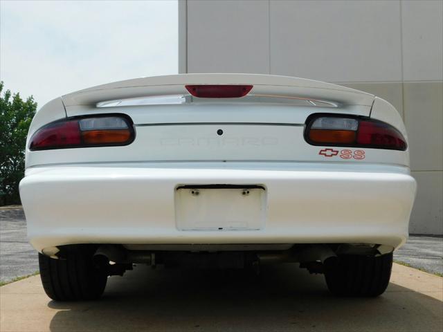 Photo of 1997 White with orange racing stripes Chevrolet Camaro