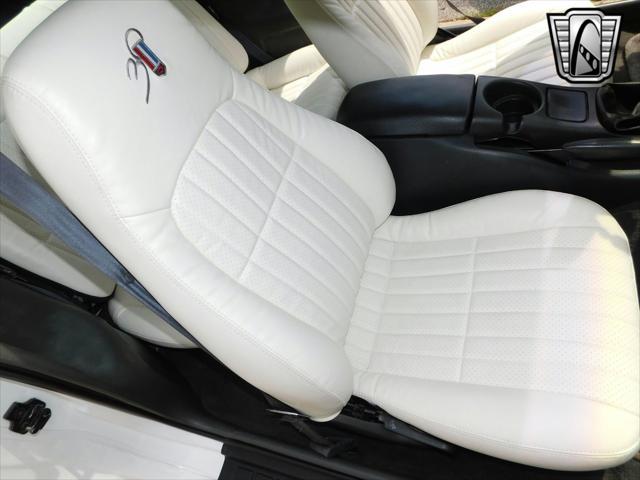 Photo of 1997 White with orange racing stripes Chevrolet Camaro