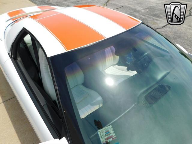 Photo of 1997 White with orange racing stripes Chevrolet Camaro