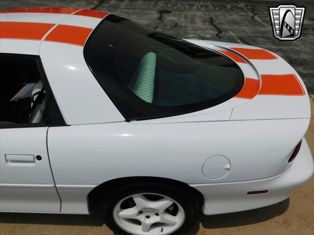 Photo of 1997 White with orange racing stripes Chevrolet Camaro