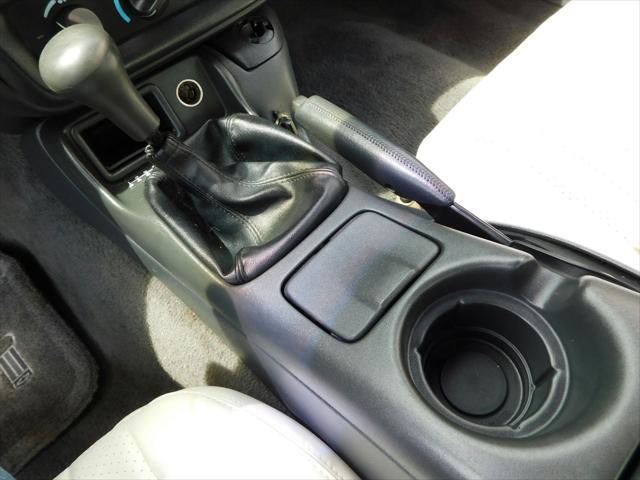 Photo of 1997 White with orange racing stripes Chevrolet Camaro