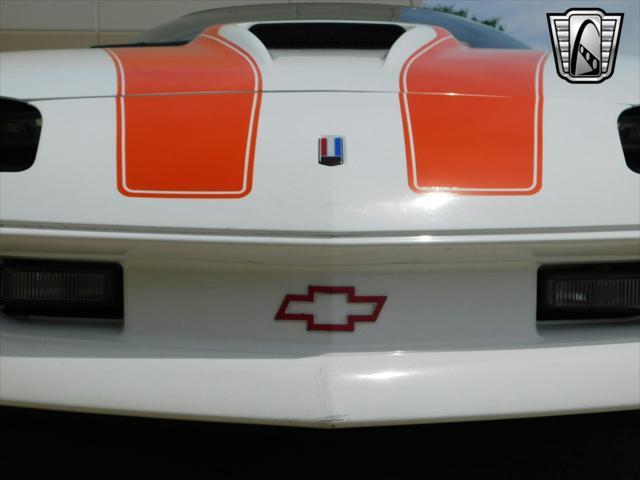 Photo of 1997 White with orange racing stripes Chevrolet Camaro