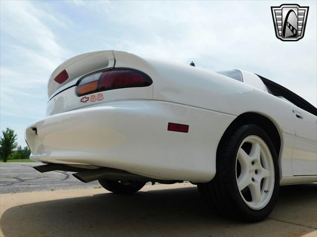 Photo of 1997 White with orange racing stripes Chevrolet Camaro